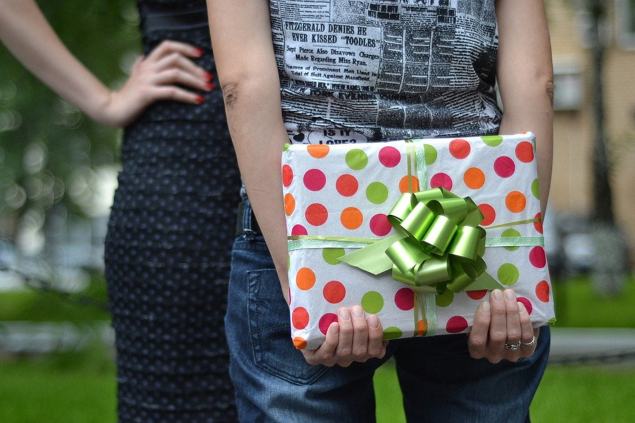 a person holding a box with a cartoon character on it