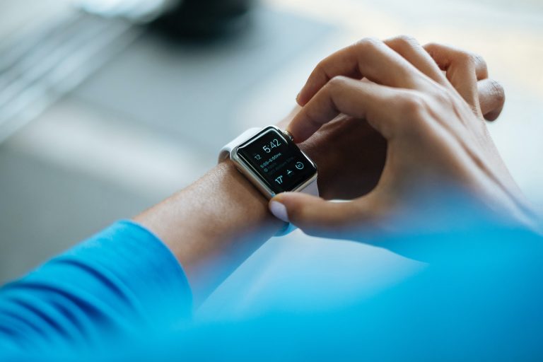 a person holding a watch